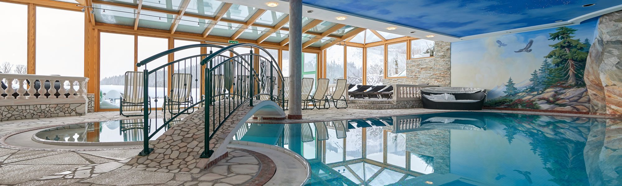 Panorama-Hallenbad in Ihrem Urlaubshotel Jagdhof in Ramsau am Dachstein